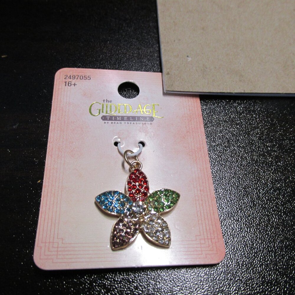 Gold tone Star with Rainbow Colored Rhinestones